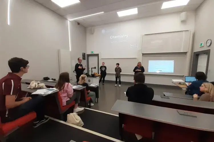 Participants listening to a lecture.